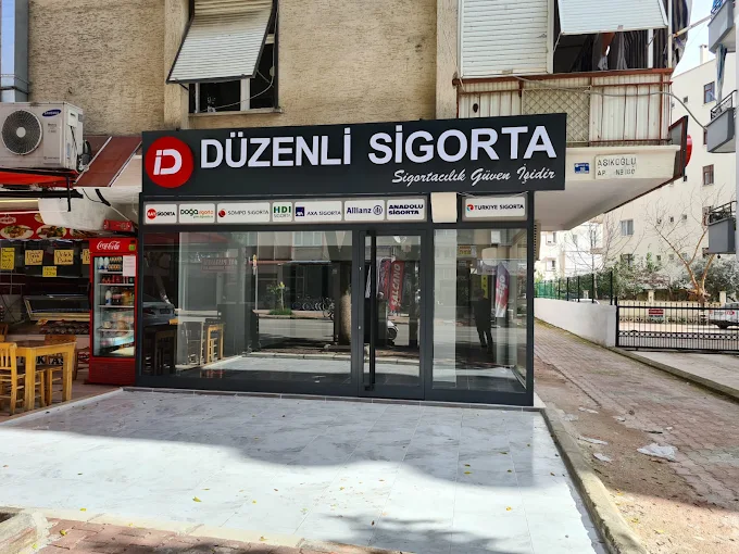Düzenli Sigorta tabelası ve anlaşmalı şirket logolarıyla Muratpaşa şubesinin cephesi